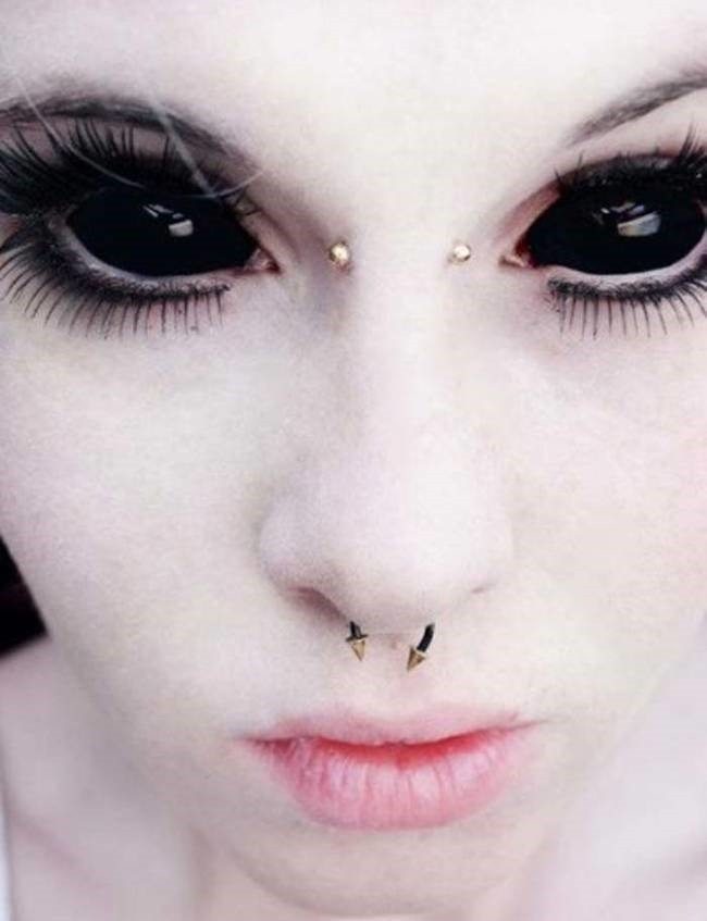 girl has tattooed eyeballs