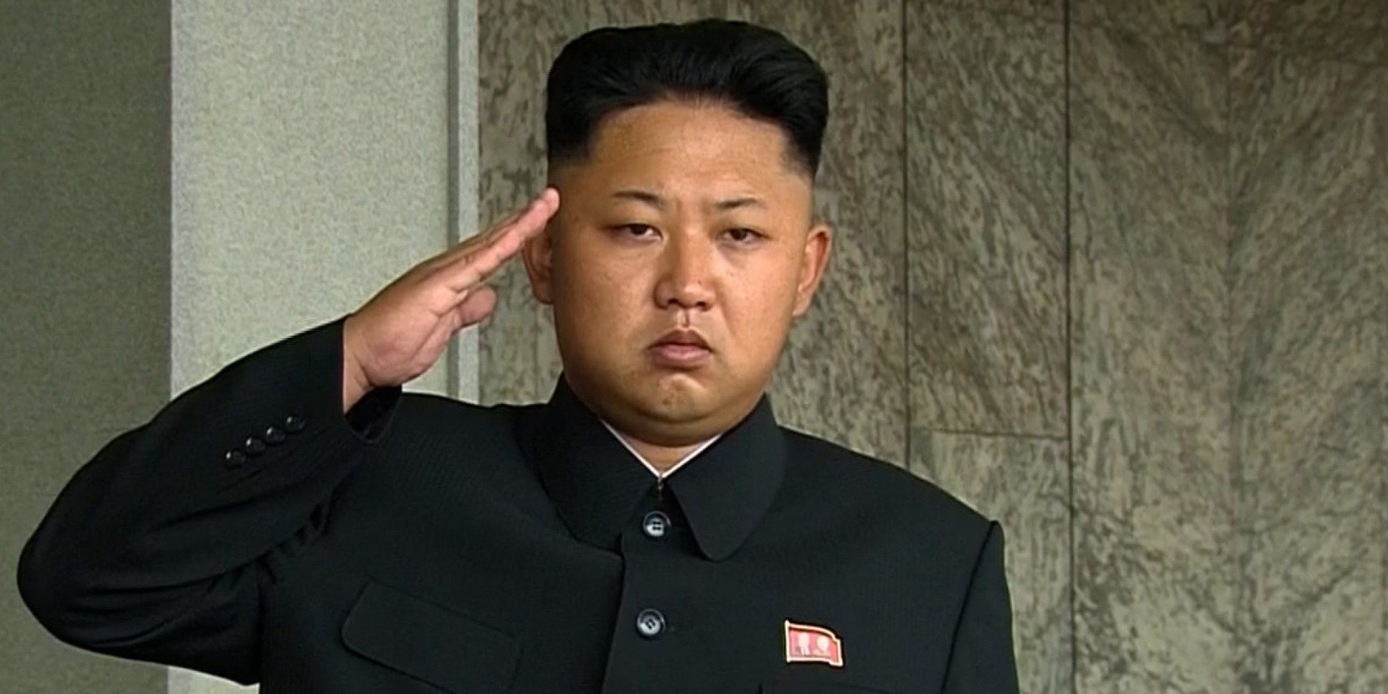 In this image taken from video North Korean leader Kim Jong Un, center, salutes during a military parade marking the 65th anniversary of the country's founding, Monday, Sept. 9, 2013, in Pyongyang, North Korea. (AP Photo/KRT via AP Video) TV OUT, NORTH KOREA OUT